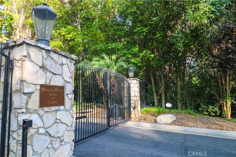 Photo of 9455 Friendly Woods Ln, Whittier, CA 90605 (MLS # PW25248494)