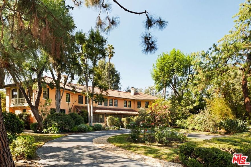 Down a winding drive off of impressive Arden Road, you will find yourself coming up on a jaw-dropping, historic Mediterranean Villa surrounded by stately pines.   Reminiscent of Southern Living, you are welcomed with a good old fashioned stunning screened in front porch to sit and sip your coffee while looking out at your rose garden. Vintage paned windows line the entire front of the expansive living room. This beauty was once the carriage house to the famed Arden Villa and has three separate living areas within a single family home. It is fabulous as is and would be a magical multigenerational compound. Each charming dwelling within the home has its own entrance from the outside, two bedrooms, living rooms and decorative fireplaces.                                                                                      But imagine turning it into your own Pasadena Estate with 6 bedrooms and quite the pedigree!  The private backyard could not be more picturesque with a gorgeous pool, separate laundry, two car garage and even a little art studio! This one of a kind carriage house has hosted movie stars and famed musicians throughout the years, as part of its legacy.                                                                Come take a look for yourself at this rare architectural offering, full of possibilities, in a dream location on prestigious Arden Road, close to Cal Tech, The Langham Hotel, The Huntington Library, and all the great shops and restaurants on South Lake Ave.                                                                                     Take advantage of this special opportunity!
