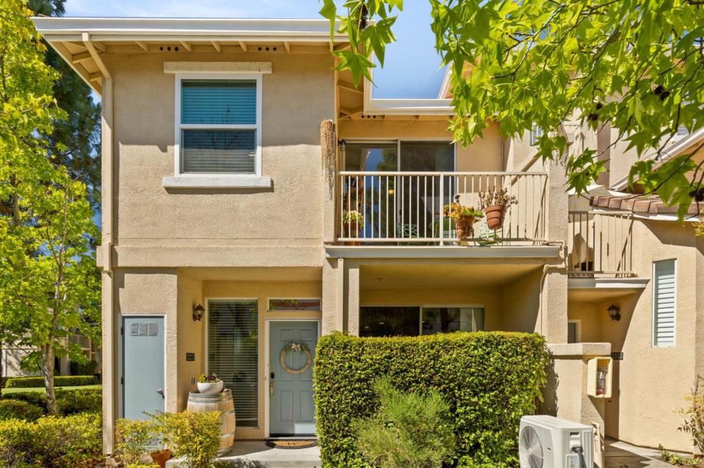 Experience elevated living in this stunning 2 bedroom, 2.5 bathroom home ideally situated at the base of the highly sought-after Communications Hill. Meticulously cared for and thoughtfully upgraded, this offers a warm blend of comfort, style, and smart home conveniences. Soaring ceilings, expansive windows, and premium finishes create an inviting atmosphere. The updated kitchen showcases sleek quartz countertops, smart stainless steel appliances, and a seamless flow to dining and living areas, ideal for both quiet evenings and stylish entertaining. Natural light and premium vinyl flooring pair with smart lights, smart thermostat, and smart appliances for a modern touch. Added upgrades include a smart door lock, smart garage door opener, new water heater and a new air handler and mini split heat pump for heating and cooling. Completing the homes appeal is its unique location. Just steps from the front door, a beautifully landscaped outdoor space creates the feel of a private backyard retreat. Perfect for summer gatherings, morning coffee, or unwinding under the stars, this rare setting extends your living space into the California air. With smart features, desirable amenities, and a prime location, this home is a wonderful opportunity.
