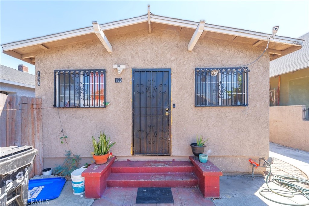 Discover this well-maintained duplex offering two spacious units on one lot. The first unit features 3 bedrooms and 2 bathrooms, including a comfortable living area, a bright kitchen, and ample storage space. The second unit offers 2 bedrooms and 1 bathroom, ideal for extended family, rental income, or a guest suite.