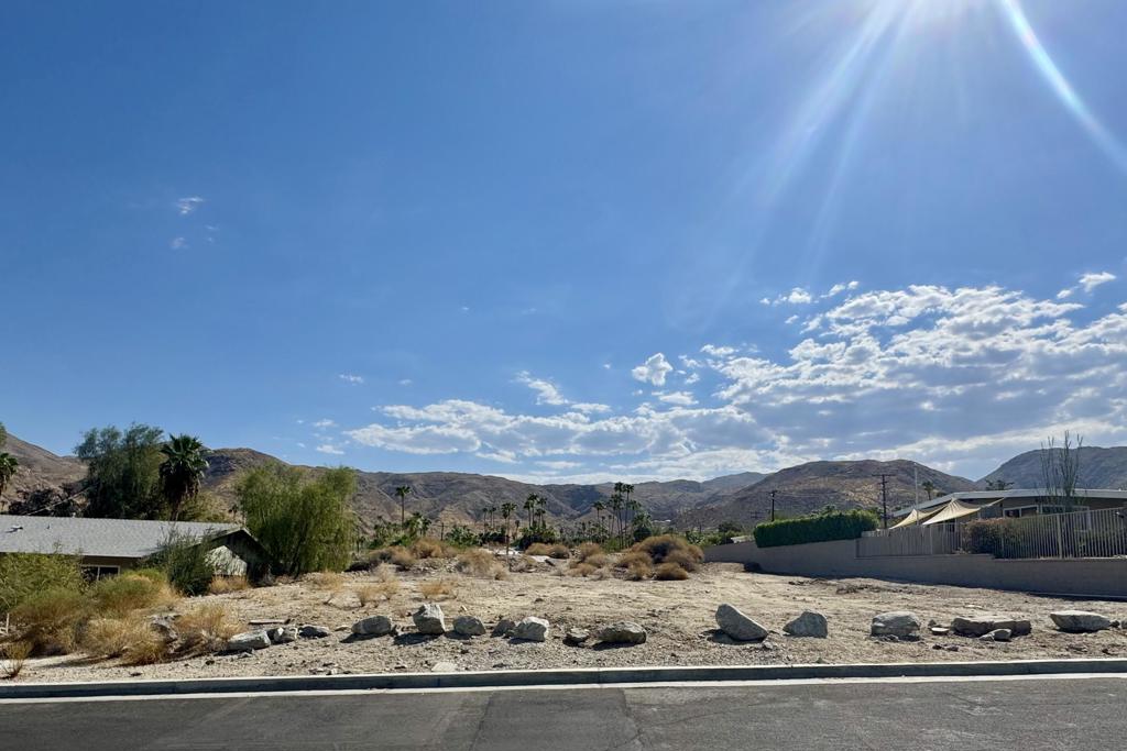 Discover the extraordinary potential of this nearly half-acre lot nestled high in the coveted Cathedral City Cove. Imagine waking up to breathtaking panoramic views every day, with the perfect backdrop for your dream home. This prime piece of land comes with significant value-adds already in place--a fully installed and paid water meter, along with the DWA fee, a combined worth of nearly $20,000. If you've been envisioning a seamless start to building, this is it!Cathedral City is a vibrant community on the rise, offering a lively blend of cultural and entertainment options right at your doorstep. From theaters showcasing both movies and live performances to a state-of-the-art amphitheater, a bustling casino, and top-tier hotels and restaurants, this location is a true convergence of comfort and excitement.For those ready to make a move, essential documents such as surveys, design plans, and parcel surveys are readily available, ensuring your journey from vision to reality is as smooth as possible. Embrace the opportunity to create something remarkable in a location where the future is bright and the possibilities endless.