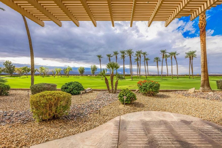 Welcome to an Extended Tangier (2 bedrooms plus a den) with a BREATHTAKING PANORAMIC view of both San Jacinto and San Gorgonio mountains !  When you enter the home you are greeted with windows enhancing the fabulous view! With beautiful wood floors and high quality roman shades. Enjoy An open concept floor plan with 10' ceilings, neutral 16'' tile and beautiful wood flooring through most of the home.  Kitchen is so light and bright with transom  windows and  lovely medium maple cabinets with updated stainless steel appliances.  Refrigerator, dishwasher, and kitchen faucet were all replaced in 2024/2025. Adjacent is the eating area surrounded by windows to again enjoy the golf course and mountain views! No homes across the fairway ... just mountains and ''mother nature''! Primary bedroom is to the left from the entry with a bay window again with views!  bedroom has a new contemporary ceiling fan in addition to black out ''duets'' on the windows. The master bath shower has been remodeled to be a ''walk in'' with new tile and  no step entry.  Beautiful wall mounted rain head shower water fixture and no slip tile on the floor. Both vanity faucets have been replaced in addition to the light fixture. There is also a STUNNING custom closet with beautiful wood and frosted glass cabinets covering the cabinets. On the opposite side of the home you will find an EXTENDED secondary bedroomwith a bathroom right next to it.  That is a tub/shower combo with new rain head hardware. Also has access to the front courtyard for your guests to sit and enjoy a cup of coffee. ! A custom closet here with mirror sliding doors ! Also near the front entry there is a den or office area. This home has so many wonderful features : An interior laundry room includes upper cabinetry in additional to a closet with lots of shelves for storage. The laundry room leads to the extended garage for 2 cars plus!  There is an epoxy floor along with cabinets for storage. To summarize the special features:HVAC replaced Water heater replaced OWNED SOLAR SYSTENWood flooring in great room and primary bedroom Epoxy floors in garage Exterior painted in new color scheme Concrete overlay in driveway. entry, and back patio New irrigation system Extended patio with alumawood patio cover and unobstructed VIEWS!This is a great floor plan with a spectacular view! All in the wonderful community of Sun City Palm Desert