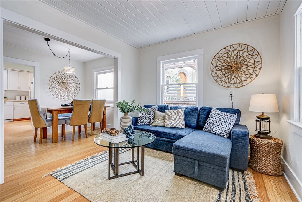 Welcome to this darling historical bungalow in South Redondo Beach! Step into a piece of history with this charming 3-bedroom plus office, 1-bath bungalow that has been cherished by the same family since the 1920s. Wood floors preserve its timeless character, while new carpet in two bedrooms adds comfort and warmth. The remodeled kitchen features stone countertops, a spacious breakfast bar, and plenty of natural light from skylights and windows that brighten the home throughout. The large grassy backyard is ideal for entertaining, gardening, or simply relaxing in your private outdoor space. A detached one-car garage provides parking, extra storage, or the perfect opportunity for a future ADU. Lovingly updated and thoughtfully maintained, this South Redondo gem is ready for its next chapter—and the perfect buyer to make it their own. Plus the location just blocks from the Redondo Beach pier, beach, shops, restaurants and of course the award winning Redondo Beach schools -makes it an amazing opportunity!