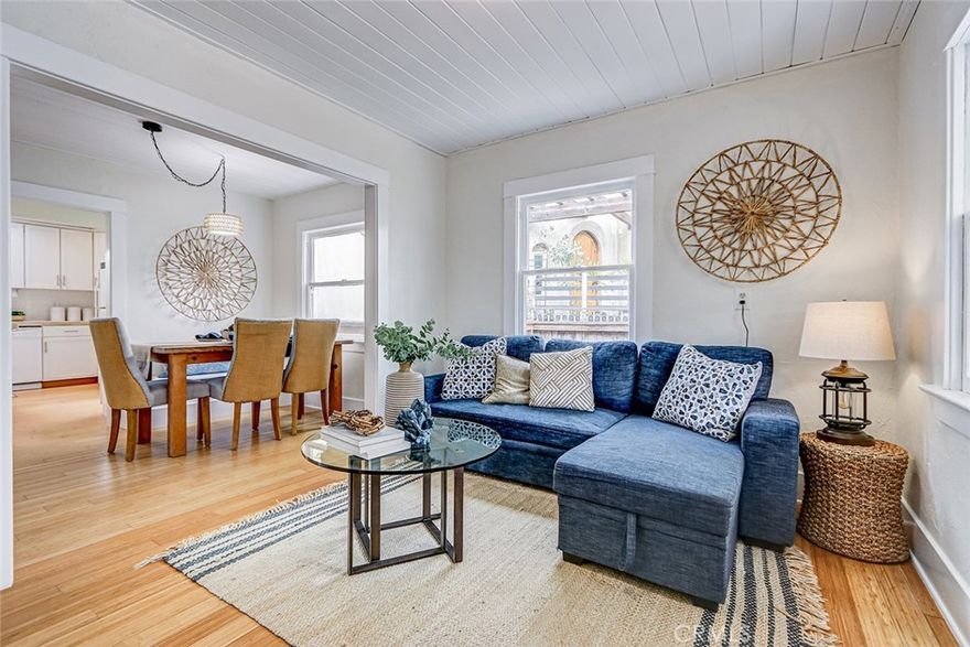 Welcome to this darling historical bungalow in South Redondo Beach!  Step into a piece of history with this charming 3-bedroom plus office, 1-bath bungalow that has been cherished by the same family since the 1920s. Wood floors preserve its timeless character, while new carpet in two bedrooms adds comfort and warmth. The remodeled kitchen features stone countertops, a spacious breakfast bar, and plenty of natural light from skylights and windows that brighten the home throughout.  The large grassy backyard is ideal for entertaining, gardening, or simply relaxing in your private outdoor space. A detached one-car garage provides parking, extra storage, or the perfect opportunity for a future ADU. Lovingly updated and thoughtfully maintained, this South Redondo gem is ready for its next chapter—and the perfect buyer to make it their own.  Plus the location just blocks from the Redondo Beach pier, beach, shops, restaurants and of course the award winning Redondo Beach schools -makes it an amazing opportunity!