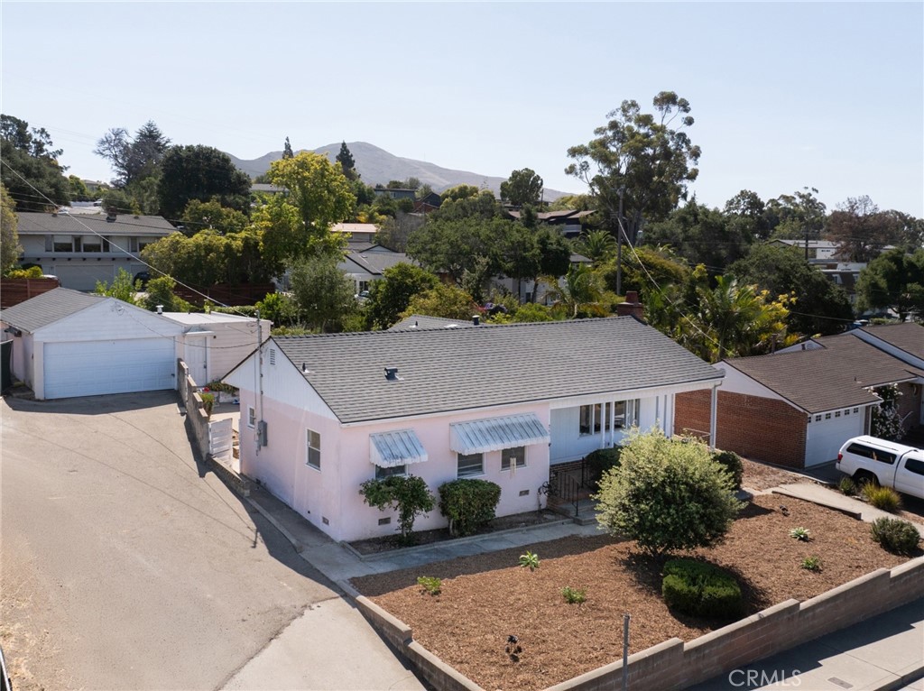 Rare opportunity to obtain an income property located just five minutes’ walking distance to Cal Poly University! The property includes two units: a 2-bedroom (ability to create a 3rd bedroom), 1.5-bath main residence with indoor laundry, plus a detached turnkey studio. The premium location delivers breathtaking views of Madonna Mountain and Bishop Peak, making it highly desirable for tenants and future growth. A huge bonus is the detached 2 car garage and large driveways for on site parking in addition to the street side parking. Cash flow potential from dual units, plus potential opportunities for additional unit development on the large lot. Situated in the heart of San Luis Obispo, you’re only a short drive to pristine Central Coast beaches and less than 30 minutes to the award-winning Paso Robles wine country. A unique chance to secure rental income and strong potential appreciation in one of California’s most sought-after university towns.