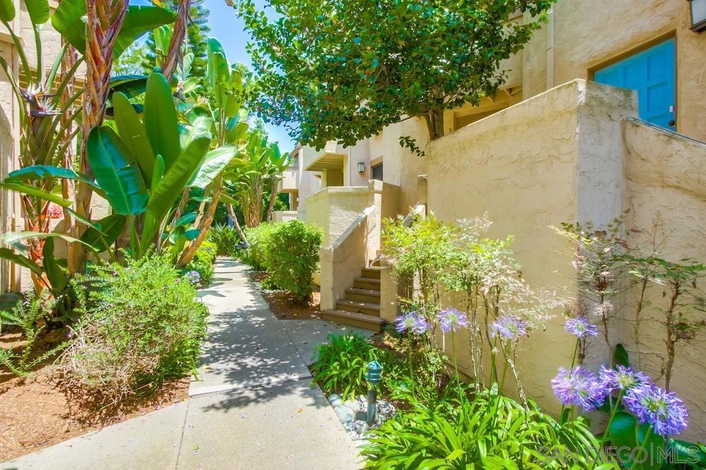 2-bedroom, 2.5-bathroom townhome located in the peaceful and centrally located Woodlands South community of La Jolla. This thoughtfully designed 2-story home offers a bright and comfortable interior with access to beautifully landscaped grounds and community amenities. The main level features a spacious living area that opens to a private outdoor patio—perfect for relaxing or enjoying San Diego’s year-round sunshine. The kitchen offers ample cabinet space, making it easy to prepare meals and stay organized. A convenient half bath is also located on the main level for guests. Upstairs, you'll find two well-sized bedrooms, and 2 full bathrooms. The home also includes an attached 2-car garage and tasteful finishes throughout. Woodlands South is a serene, well-kept community featuring open greenspace, a playground, and a community pool—offering a great environment for both quiet enjoyment and outdoor activity. Located just minutes from UCSD, La Jolla Village, shopping, dining, and beaches, this townhome offers easy access to everything you need.