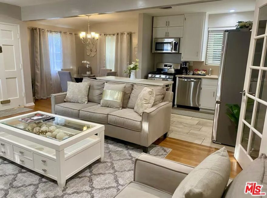 Step into this beautifully furnished single-family residence in the heart of North Hollywood, offering the perfect blend of charm, comfort, and modern convenience. This 2-bedroom, 1-bath home boasts 1,350 sqft of thoughtfully designed living space on an expansive 6,640 sqft lot, providing endless opportunities for outdoor living, and entertaining. Inside, you'll find a warm and inviting layout with stylish finishes throughout. The living areas are spacious and filled with natural light, creating a cozy yet elevated atmosphere for both relaxation and entertaining. The kitchen is designed with modern upgrades and sleek finishes, making it a dream for home cooks and families alike. Both bedrooms are generously sized, offering comfort and tranquility, while the bathroom features tasteful updates that balance functionality with style.What truly sets this property apart is the HUGE lota rare find in the area! Whether you envision lush gardens, a play area for kids or an entertainer's paradise with outdoor dining and lounge spaces, this backyard provides the canvas to bring your vision to life. Perfect for families or those looking for a turnkey furnished home, this property offers an incredible lifestyle opportunity in one of LA's most convenient locations. With proximity to the studios, shopping, dining, and easy freeway access, you'll have everything you need right at your doorstep.