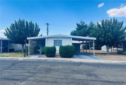 Photo of 15940 Stoddard Wells Rd #83 Rd, Victorville, CA 92395 (MLS # HD25199690)