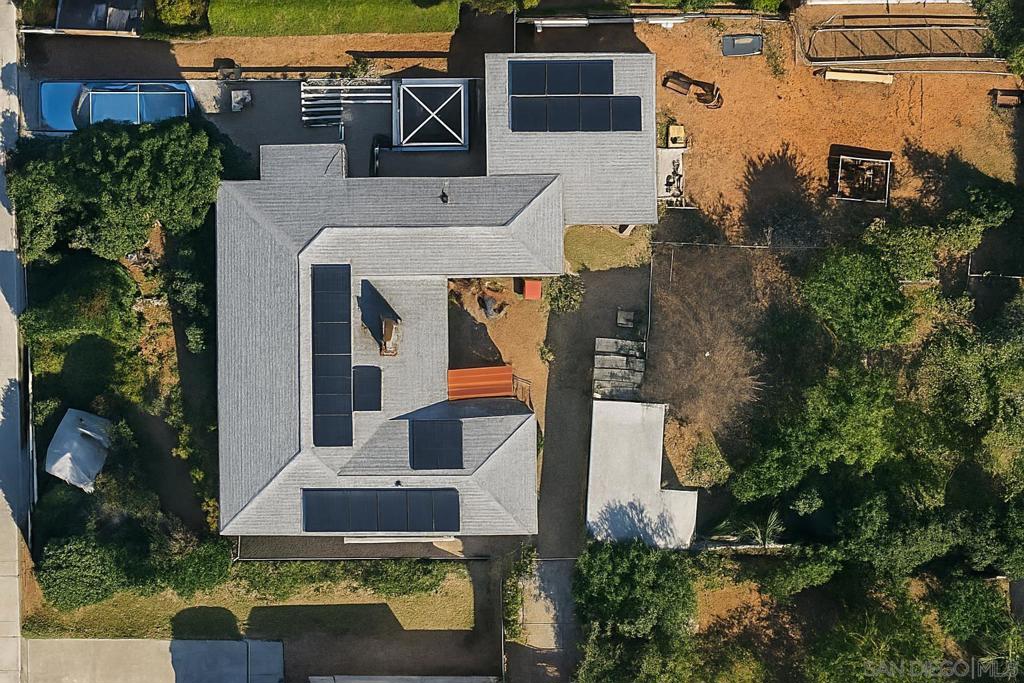 Welcome to 74 E St — a charming 3-bedroom, 2-bath single-story home on an exceptionally large 9,200+ sq ft lot in the heart of Chula Vista. Built in 1951, this 1,314 sq ft home offers more than just a place to live — it offers a rare opportunity to create something extraordinary. Step inside and you'll find a spacious layout with abundant natural light and generously sized bedrooms. While the interior may need a few weeks of TLC and updates, the true value lies outside — where years of love and care have transformed the grounds into a lush, private retreat. Imagine the possibilities: harvesting your own grapes, lemons, peaches, calamansi, guava, and more from mature, fruit-bearing trees. Picture colorful flowers welcoming you at the front entry, and a backyard so expansive it invites dreams — whether that’s building an ADU, creating a vibrant garden oasis, or designing an entertainer’s paradise. This is not just another home — it’s a chance to invest in space, freedom, and long-term potential in one of Chula Vista’s most established neighborhoods. Includes a detached 1-car garage, generous driveway parking, and unbeatable access to schools, parks, dining, I-5, and downtown Chula Vista. No HOA. No Mello-Roos. Properties like this — with land, location, and limitless upside — don’t come around often.