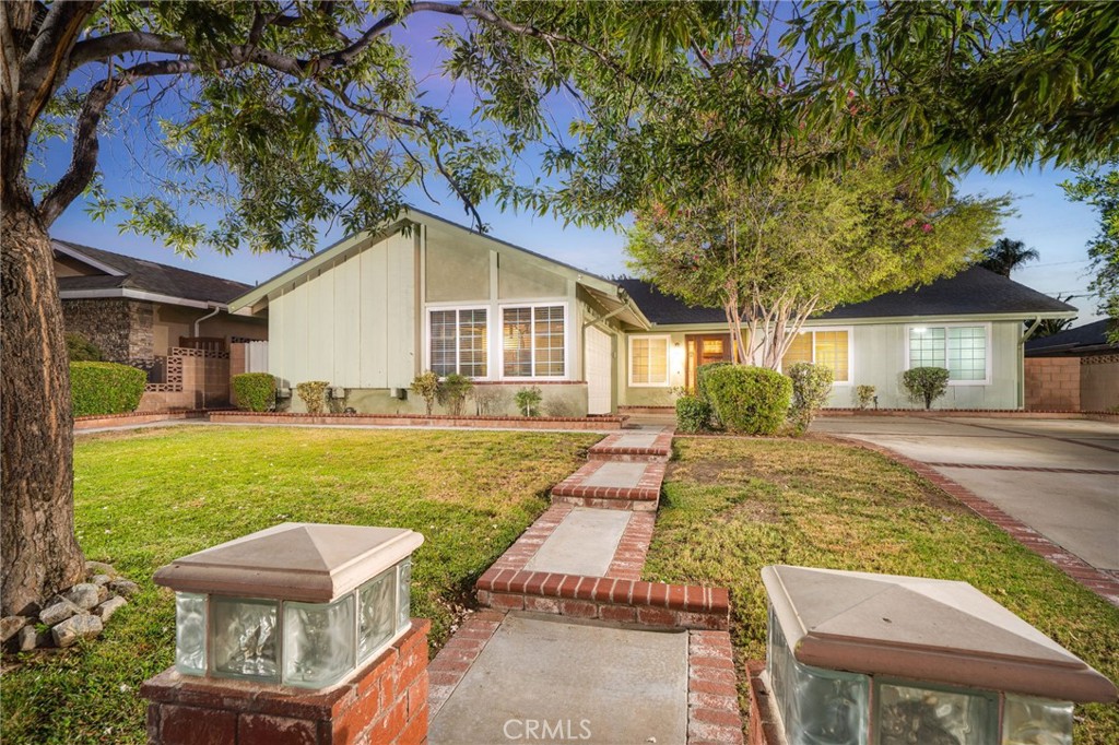 Welcome to this beautifully maintained 3-bedroom, 2-bathroom single-story home located in the highly sought-after Fox Glen neighborhood of North La Verne. Offering 1,353 sq ft of comfortable living space on an expansive 7,940 sq ft lot, this home combines functionality, charm, and outdoor enjoyment. A welcoming brick trimmed front walkway with pillar lights and a cozy porch lead you to a newer front door and into an open-concept floor plan featuring a spacious living room with cozy brick fireplace and an adjacent dining area with sliding doors opening to a covered patio. Updated kitchen with granite countertops, stainless steel appliances, including refrigerator, gas range, microwave, dishwasher, and a cozy breakfast nook.
The primary suite includes generous closet space and an en-suite bathroom with a tiled shower. Two additional bedrooms feature spacious closets and share an updated hall bathroom with a new vanity and tub/shower combo. Upgrades Include, newer roof, dual pane windows, laminate flooring throughout, heating and air conditioning system, upgraded interior panel doors, and recessed lighting. Step outside to a private backyard oasis, complete with covered patio ideal for al fresco dining, separate lawn/play area, gated pool with slide and expansive deck space for lounging or entertaining Additional highlights include a 2-car attached garage with direct home access and laundry facilities, and a spacious driveway with ample parking. Located in the award-winning Bonita Unified School District, and walking distance to San Dimas Canyon Park, featuring picnic areas, horse trails, and hiking paths, this home offers the perfect blend of suburban comfort and outdoor lifestyle.