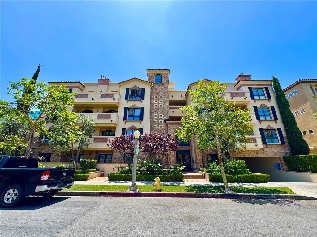 Beautifully appointed two-story townhome-style condo is located in one of Studio City's most sought-after neighborhoods. Situated at 12026 Hoffman Street #101, this unit offers approximately 1,600 square feet of thoughtfully designed living space, including three bedrooms and three full bathrooms. The home combines privacy and elegance with an open-concept layout, high ceilings, and abundant natural light throughout. The main level features a spacious living room with a gas fireplace that opens to a private rear patio, perfect for indoor-outdoor entertaining. The gourmet kitchen is a standout with quartz countertops, a mosaic tile backsplash, and high-end Jenn-Air stainless steel appliances. A guest bedroom and full bath on the lower level offer flexibility for visitors or a home office. Upstairs, the primary suite includes a large walk-in closet, a luxurious bathroom with soaking tub and separate walk-in shower, and an additional ensuite bedroom with its own full bath. A stackable washer and dryer are conveniently located on the upper level, and the home is equipped with central air and heat. Residents will enjoy the security and convenience of gated garage parking with two assigned tandem spaces, as well as access to community amenities including a fitness center, library/study room, elevator, and a beautifully landscaped courtyard with fountain. The building is pet-friendly, and water and trash services are included in the lease. This home is located within the highly desirable Carpenter Community Charter School district, one of the most sought-after public elementary schools in Los Angeles. Families also have access to a range of excellent private school options nearby, including Harvard-Westlake School, Campbell Hall, Oakwood School, and Bridges Academy, all known for their strong academics, arts, and college preparatory programs. Just steps away from CBS Studios, Ventura Boulevard, Joan’s on Third, Alfred Coffee, Trader Joe’s, and the Studio City Farmers Market, the neighborhood offers exceptional walkability with a Walk Score of 93. Commuters will also appreciate easy access to the 101 Freeway and nearby studios and business centers.