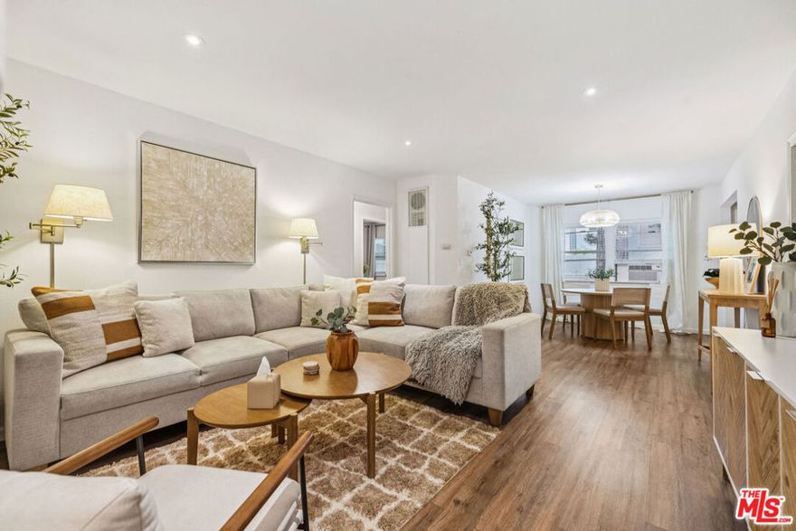Welcome to this beautifully renovated condo, ideally located in the gated and guarded Cameo Woods community. ***This home may qualify for a $20,000 grant and special financing through City National Bank*. Surrounded by mature trees, this home offers a peaceful sanctuary in the heart of Los Angeles. The spacious and sleek interior features a thoughtfully designed floor plan with a seamless flow between the living, dining, and kitchen areas, perfect for relaxing and entertaining. The kitchen opens to a tranquil, semi-private outdoor seating area. This move-in-ready home has been tastefully updated with copper plumbing, a newer water heater, recessed lighting, and an in-unit washer and dryer. The condo blends modern design with comfort and character throughout. Community amenities include a swimming pool, two spas, a tennis court, a dog park, a clubhouse, and a community garden, all of which are maintained by the HOA. The HOA also covers 24/7 security, water, sewer, trash removal, gardening, and common area maintenance. The property features a private one-car garage and ample guest parking. Conveniently located near Beverly Hills, LAX, UCLA, USC, and major studios, this condo is also walkable to local favorites like Destroyer, Whole Foods, Jackson Caf, and the Culver City Stairs. Just minutes from the Platform, Helms District, the Expo Line, and Kenneth Hahn State Park, this home offers the perfect balance of urban convenience and natural beauty.