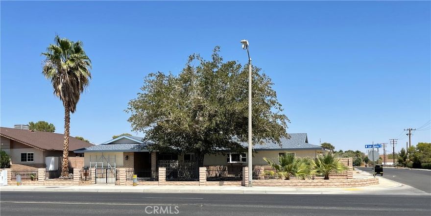 Welcome to this charming single-story home in the heart of Ridgecrest! This beautifully 2-bedroom, 2-bathroom residence offers 1,593 sq ft of thoughtfully designed living space, blending modern upgrades with classic appeal. Step inside to a bright and airy interior featuring a spacious living room with a cozy fireplace, a generous laundry room, and a carpeted, covered patio that opens to a large backyard—perfect for entertaining or relaxing under the California sun.

The open-concept kitchen is a true highlight, boasting a stylish breakfast bar, ample counter space, and elegant cabinetry. Both bedrooms are generously sized with large closets for plenty of storage, while the two bathrooms offer abundant space and functionality.

A versatile family room provides the ideal setting for guests, a TV lounge, or a home office. Outside, the expansive backyard offers endless possibilities for outdoor fun and gatherings. The detached one-car garage adds even more value with extra storage and potential for a workshop.

With its inviting atmosphere, smart layout, and prime location, this Ridgecrest gem is the perfect place to call home. Don’t miss your chance—schedule a showing today and make it yours!