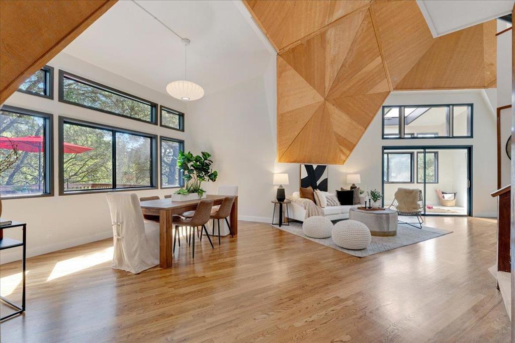 This beautifully updated modern mountain home offers tranquility and convenience on 10 sun-drenched, forested acres. The open floor plan boasts soaring ceilings, skylights, and large windows that blend indoor and outdoor living. A fresh kitchen and bathrooms add a contemporary touch, while a cozy wood-burning stove invites relaxation. The versatile 4th bedroom doubles as an office or sunroom (no closet), with an additional upstairs nook for unwinding. Expansive front and rear decks provide perfect spaces for quiet moments or entertaining. Previously home to horses and goats, the property is ideal for farming, gardening, or simply enjoying nature. Large lighted basement offers workshop space, and a private outdoor area near the water storage tank that has water and electricity. Just a few minutes from town, with easy access to hiking trails, golf and Beaches. Easy to get to freeways and Bay Area or Monterey/Carmel. This rare mountain retreat is a must-see!