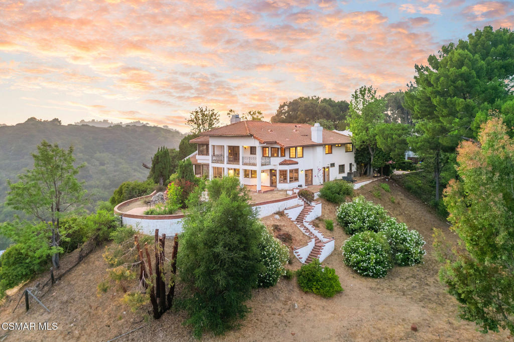 Elevated Living Above the City.Perched atop nearly 3 private acres in the coveted Bel Air Ridge community, this newly refreshed estate is a sanctuary of light, space, and iconic Southern California views. With sweeping 360 vistas that capture the majesty of the surrounding canyons by day and the glittering city skyline by night, this 6-bedroom, 5.5-bath residence offers an extraordinary blend of serenity, sophistication, and timeless appeal.Spanning approximately 5,800 square feet, the home has been beautifully updated with new wide-plank flooring, contemporary lighting, and crisp designer paint throughout, creating an effortlessly elevated aesthetic that complements its dramatic setting. Gracious formal and informal living areas offer the perfect backdrop for everything from intimate gatherings to large-scale entertaining, while a gourmet kitchen, spacious dining room, and multiple lounges open seamlessly to a series of sunlit terraces and patios that embrace the indoor-outdoor lifestyle.Thoughtfully designed to suit both refined entertaining and the comforts of everyday living, the flexible layout includes generous guest suites, a central family room, and a serene primary retreat with panoramic views and ultimate privacy. Every room has been carefully oriented to maximize light and capture the surrounding natural beauty, offering a tranquil escape without sacrificing proximity to the city.Set within the prestigious Bel Air Ridge community, homeowners have access to six world-class tennis courts, a multi-sport/pickleball court, a state-of-the-art fitness center, two sparkling pools, a spa, a stylish clubhouse, 24 hour security patrol and a serene private park. Bel Air Ridge has also recently been officially recognized as a Firewise USA(r) Community by the National Fire Protection Association (NFPA), offering added peace of mind.Moments away, residents can stroll to the Glen Centre to enjoy upscale restaurants, cafes, and boutiques, blending the convenience of modern amenities with the tranquility of a tucked-away hillside neighborhood. Behind a private gate and surrounded by nature, yet just minutes from the heart of Beverly Hills and the Westside, this property presents a rare opportunity to live expansively in one of Los Angeles' most desirable enclaves. Located within the highly sought-after Roscomare Road Elementary School district and near many of the city's top private schools, this estate speaks to those who value privacy, elegance, and the art of living well.