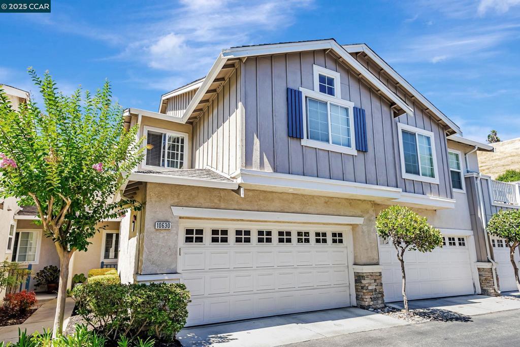 Welcome to this Stunning home in the desirable California Highlands community! Wonderfully situated in the rear of the complex it provides you with a level of privacy while being surrounded by oak trees, and gorgeous landscaping. Elegantly appointed architectural design with vaulted ceilings, an open floor plan, a wealth of natural lighting, contemporary light fixtures, recessed lighting, and rich interior and exterior colors. Superb kitchen with a gas stove, stainless-steel appliances, and quartz counter tops. Spacious bedrooms including a primary bedroom that offers a walk in closet and sunken tub with dual sinks. Powder Room conveniently located on the main levle. Additional features include an office desk nook at the stair landing, living room with wood burning fireplace, dual pane windows and central heat & air. Enjoy the view of the Dublin hills as you drive home to relax in your private patio featuring florals and trees or swim in the community pool and spa. Top rated Dublin Schools. Close to shopping, restaurants, parks, hiking trails, BART, and easy 580/680 freeway access.
