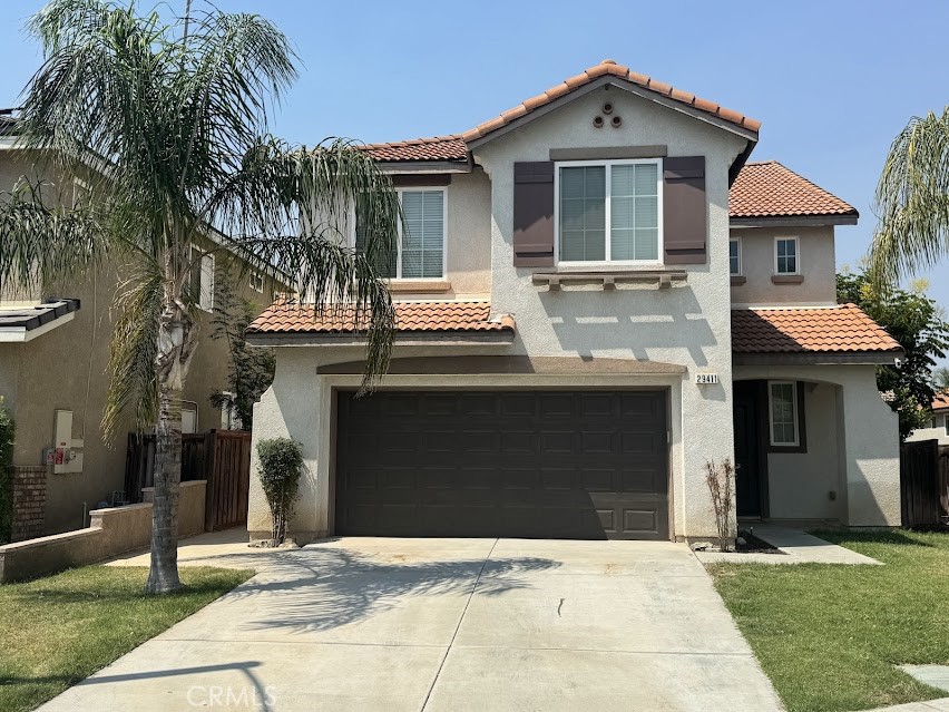 Welcome to 29411 Piazza Court, Menifee, CA 92584—a beautifully home nestled on a quiet cul-de-sac in the Menifee Lakes area. This spacious residence offers 2,249 sq ft of living space with 4 bedrooms upstairs, plus an additional bonus room on the main floor (easily adapted into a 5th bedroom with full bath), making it perfect for guest quarters, a home office, or flexible living arrangements. Built in 2006, the home welcomes you with soaring ceilings, tiled floors, recessed lighting, and freshly updated paint and carpet on the second floor, staircase, and bonus room. Gather in the inviting family room with cozy fireplace that seamlessly connects to the kitchen featuring stainless steel appliances and a generous center island. Upstairs, the primary suite boasts a walk-in closet, dual sinks, a separate tub, and enclosed shower, with additional bedrooms, an upstairs laundry room, and linen storage nearby. With a 2-car attached garage and a sunny backyard offering plenty of room to relax or play, this move-in-ready home blends functionality and charm in one of Menifee’s most desirable neighborhoods.