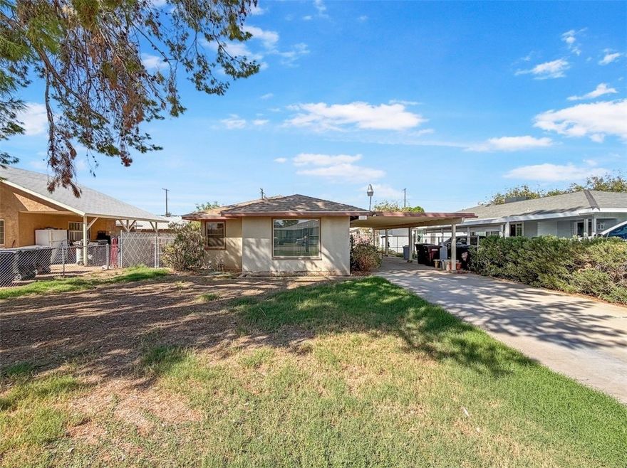 This 4-bedroom, 2-bath home offers 1,304 sq. ft. of living space and is full of potential! Inside, you’ll find a spacious living room and a nice-sized dining area that provide plenty of room for gatherings. The kitchen, while cozy, is functional and includes laundry hookups for added convenience.

The bedrooms are generously sized, with the primary bedroom offering extra space and comfort. Both bathrooms are fully functional and ready for your personal updates. This home presents the perfect opportunity to modernize and make it your own while maintaining its solid, original charm.

Outside, enjoy a large backyard ideal for entertaining or gardening, along with a nicely sized front yard. The property also features an attached carport and a concrete slab that extends from the front of the home all the way to the back fence—great for parking, projects, or outdoor living space.

If you’re looking for a home with great bones and room to add your own touch, this one is a must-see! Schedule a showing today.