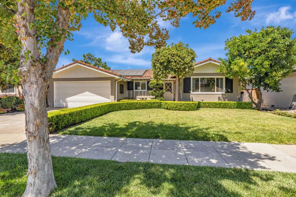 Exquisitely remodeled, this 4-bedroom San Jose residence blends timeless elegance with modern functionality. Updated in 2017, the home features vaulted ceilings, hardwood floors, crown molding, recessed lighting, and thoughtfully designed living spaces. The chefs kitchen is appointed with quartz countertops, high-end stainless steel appliances, a wine fridge, and a spacious wet barperfect for entertaining in style. Folding Catalina doors open to a beautifully landscaped backyard, creating seamless indoor-outdoor living. The bathrooms have been tastefully renovated with designer finishes, while the newer plumbing system offers added peace of mind. Sustainability meets sophistication with an owned solar system (installed in 2016), Tesla charger, durable metal roof, and central A/C for year-round comfort. Located near top amenities and zoned for highly rated Oster Elementary, this home presents a rare opportunity to enjoy luxury, efficiency, and convenience in one of San Joses most desirable neighborhoods.