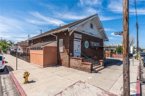 Photo of 950 W 42nd PL, Los Angeles, CA 90037 (MLS # SR26183962)