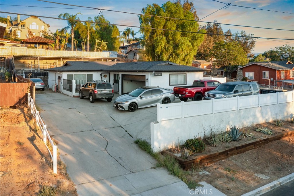 This horse property offers a private backyard with stables and a spacious front patio perfect for entertaining. Enjoy beautiful sunset views and the potential to create a custom BBQ area or outdoor living space. The front driveway provides easy access for RVs, boats, and construction vehicles.
Located just minutes from the 15 and 91 freeways and close to Orange County, this home is conveniently situated near 6th Street’s parks and entertainment ideal for horse riding enthusiasts.
Before entering the home, you’re welcomed by an additional front patio. Inside, you’ll find an open-concept layout connecting the family room, kitchen, and bonus room. The kitchen features a center island and modern color scheme, perfect for entertaining. Just off the bonus room is a spacious primary bedroom with a sliding door that opens to the side yard. Down the hallway are three additional bedrooms, a full bathroom, and an indoor laundry area.
This 4-bedroom, 2-bathroom home includes recent upgrades such as a brand-new roof installed four years ago, newer vinyl fencing, and upgraded concrete work to enhance privacy and curb appeal.