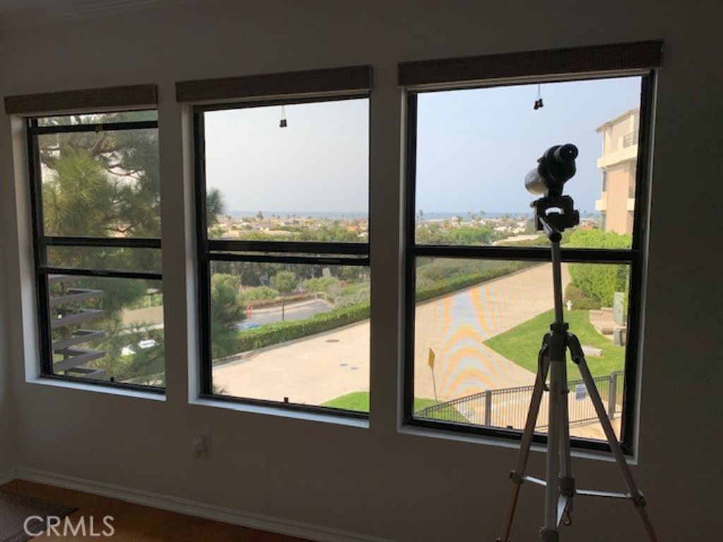 Photo of 280 Cagney Lane #215, Newport Beach, CA 92663 (MLS # OC25242231)