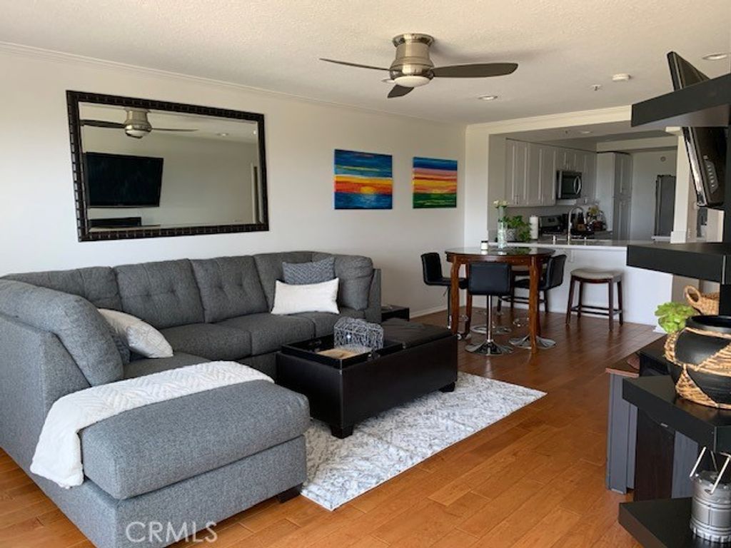 Photo of 280 Cagney Lane #215, Newport Beach, CA 92663 (MLS # OC25242231)