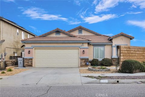 Photo of 9301 Creosote Ave, Oak Hills, CA 92344 (MLS # HD26035175)