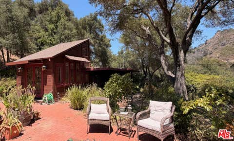 Photo of 19559 Cave Way, Topanga, CA 90290 (MLS # 26868829)