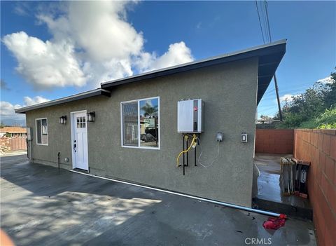 Photo of 1564 W Phillips Boulevard, Pomona, CA 91766 (MLS # CV25282096)