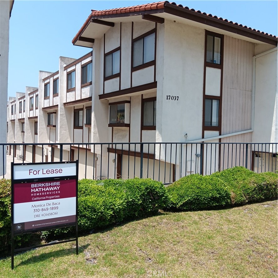Welcome to this beautifully updated townhome located in a well-maintained community just minutes from the 110 and 91 freeways, with shopping, dining, and everyday conveniences nearby. This spacious home features high ceilings in the primary bedroom, giving an open and airy feel, along with tastefully remodeled bathrooms for a modern touch. The kitchen is perfect for cooking enthusiasts, featuring brand-new appliances, stylish tile flooring, and all-new cabinetry. Enjoy the convenience of ample storage space in the updated attached garage with new epoxy flooring, which also includes an EV charging hookup--ideal for electric vehicle owners.
