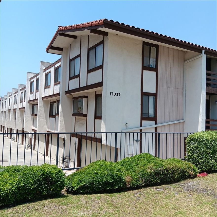 Welcome to this beautifully updated townhome located in a well-maintained community just minutes from the 110 and 91 freeways, with shopping, dining, and everyday conveniences nearby. This spacious home features high ceilings in the primary bedroom, giving an open and airy feel, along with tastefully remodeled bathrooms for a modern touch. The kitchen is perfect for cooking enthusiasts, featuring brand-new appliances, stylish tile flooring, and all-new cabinetry. Enjoy the convenience of ample storage space in the updated attached garage with new epoxy flooring, which also includes an EV charging hookup--ideal for electric vehicle owners.