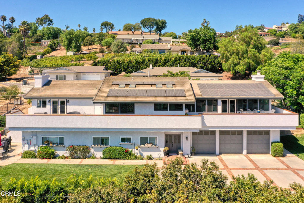 Hurry to see this spacious private, custom, 4+2 gated view property with attached 2+1 ADU. The property is in model perfect condition with fruit trees, view decks, oversized 3 car garage, paid solar equipment (including 2 Tesla battery backups), 3 fireplaces and RV parking on over 1/2 acre. Large great room with tall ceilings, beautiful kitchen and spacious dining areas, Life Source water purification throughout, wrap around view decks to soak in the views. The primary bedroom with fireplace, tall ceilings and view deck access is captivating. The primary bath features a beautiful tub, separate steam shower and walk-in closet access.The large ADU with 2 bedrooms, full bath, fireplace and full kitchen is a real bonus. Check out the private yards, numerous fruit trees (including 4 producing macadamia nut trees, large RV parking with electric and water hookups and all contained if this gated showplace!See attached documents for floorplans.
