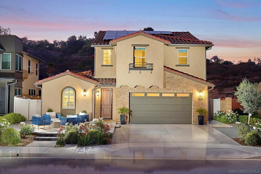 Bask in the refinement of this stunning newer build, Next Gen home. Entry level attached ADU with its own entrance, living room, kitchenette, bedroom, bath & laundry—ideal for multi gen, guests or rental income. Main home boasts soaring 25’ ceilings, a chef’s kitchen with quartz counters & designer splash, a downstairs primary suite, & seamless flow to the California Room.  Professionally landscaped yard with view fencing and open space behind. Upgrades abound including owned solar, LVP flooring, motorized blinds, & herringbone tile. Escape from it all in this sanctuary & still be minutes to all the conveniences. Quiet cul-de-sac near parks, trails & top-rated San Marcos schools.