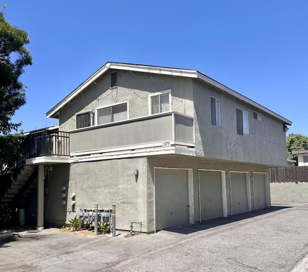 Welcome to 1379 McQuesten Drive #D and this cozy 2 bedroom 1 bath single level condominium home encompassing 876 SF. Entry is via a private balcony patio. Light filled spacious main room is highlighted by hardwood flooring that continues into the 2 bedrooms. Dine in kitchen features granite countertops, a brand new electric cook top/oven with refrigerator amid stained wood cabinetry. A deep one car attached garage and community laundry facilities are included. Privacy and sound insulation is enhanced as the home has only one common wall in one of the bedrooms and no neighbors below on the first floor. Convenient commute corridors including Highways 280/680 and 101 are minutes away. Welcome home !