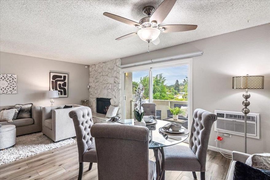 Beautifully updated 3BR, 1.5BA end unit at Creekside Park. With no adjoining walls, this home provides exceptional privacy. As you enter, you'll be greeted by an open living area that bathes in natural light and features a cozy wood-burning fireplace. This inviting space extends onto a deck that offers scenic neighborhood views, perfect for relaxation. The spacious dining area seamlessly connects to an airy, remodeled kitchen. Here, you'll find newer stainless-steel appliances, a breakfast bar, and elegant counters, making it a delightful space for culinary endeavors. Enjoy two distinct outdoor areas, including a private, fenced patio and a separate deck, providing ample opportunities to take advantage of the California climate. Take advantage of the convenience offered by an indoor laundry area featuring a washer and dryer. Situated well off Pleasant Hill Road, this residence boasts a tranquil setting with a sparkling pool and two parking spots: one carport and one open space. You'll appreciate the abundance of amenities just around the corner, including restaurants, cafes, and shops. Plus, it's a short distance to miles of walking and bike trails, and nearby neighborhood parks offering recreational options. With easy access to highways 24 and 680, commuting is a breeze.