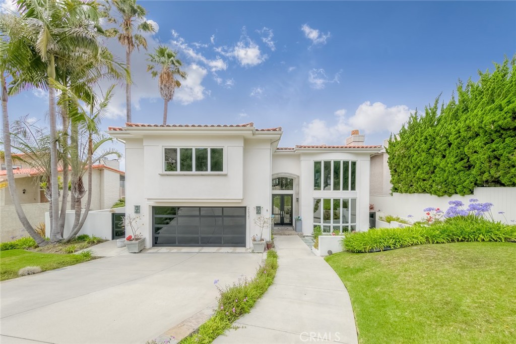 ELEGANT COASTAL LIVING IN UPPER LUNADA BAY
Welcome to 2637 Via Olivera, a meticulously upgraded 4 bedrooms, 4 bathrooms estate perched in the heart of Palos Verdes Estate's prestigious Upper Lunada Bay. This 4030 sqft home blends timeless Mediterranean elegance with modern luxury, offering breathtaking ocean views, refined interiors, and resort-style amenities on a sprawling 8202 sqft lot.
From the moment you step inside, rich French oak hardwood floors, custom millwork, and abundant natural light set the tone for refined living. The versatile floor plan includes dual primary suite, a sunken living room with a classic fireplace, and a stunning chef's kitchen outfitted with Viking appliances, marble countertops, and a full butler's pantry.
Step outside to your private backyard oasis- a professionally landscaped retreat with a saltwater pool/spa, outdoor kitchen, and seamless indoor-outdoor flow, ideal for entertaining or serene sunset evenings. Built on solid bedrock, this home is as secure as it is stylish.
Property has a 50amp Tesla Charger.
Located on a tranquil, tree-lined street near top-rated schools, scenic trials, and the bluffs of Polos Verdes, this is California coastal living at its finest.