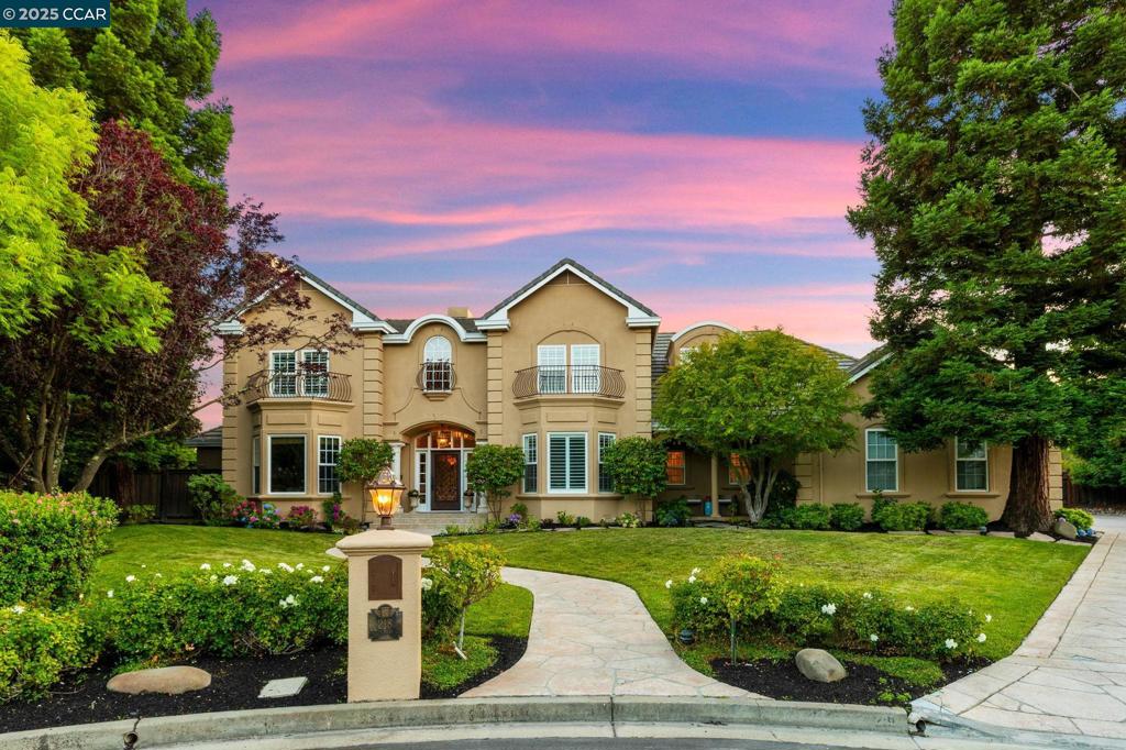 Discover luxury living at the end of a peaceful cul-de-sac in the prestigious Northridge Estates. Set on a flat, private 0.6-acre lot, this beautifully updated home offers spacious elegance, designer finishes, and a seamless indoor-outdoor lifestyle. Grand entry with two-story ceilings, wrought iron staircase, and newer wide plank hardwood floors. Private home office with its own entrance and patio, boxed ceiling with molding, and double door entry. Formal living & dining rooms with crown molding, gas fireplace, and backyard views. Gourmet chef’s kitchen with quartz countertops, large island, walk-in pantry & GE Monogram appliances: double ovens, 6 gas burner cooktop, built-in refrigerator. Spacious family room with vaulted ceilings, built-ins, gas fireplace, and French doors to patio Downstairs guest suite with walk-in closet and private bath and french doors to patio. Upstairs junior suite + 2 secondary bedrooms with upgraded finishes. Luxurious primary suite with 3 walk-in closets, gas fireplace, and spa-like bath. Resort-style backyard includes a large pergola, pebbletec pool, spa with electric cover, hot tub, play structure, playhouse, outdoor fireplace and space for a sports court or ADU. Enjoy HOA amenities: pool, clubhouse, tennis, & basketball courts. OPEN SAT & SUN 2-4