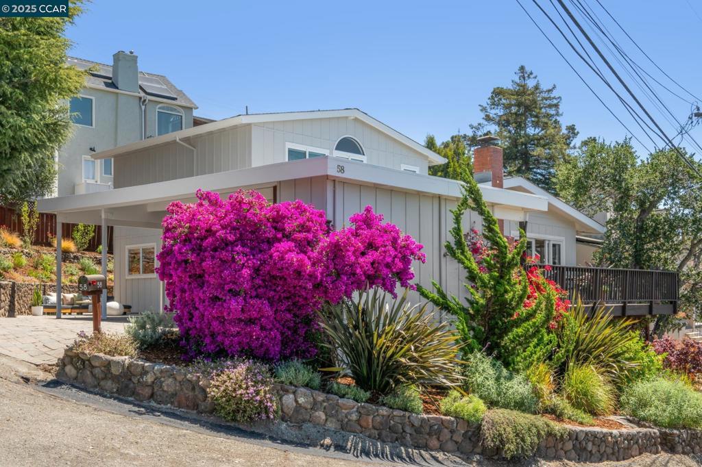 Stylishly updated and move in ready 4BD/3BA/2,035± sq. ft. contemporary style home located in an ideal Upper Rockridge location featuring an open floorplan, abundant natural light, seamless indoor/outdoor flow, and a wonderful view deck offering SF, Bay, Golden Gate and Bay Bridge views. Smartly updated with white oak floors on the entry level, heat pump (heat and a/c), newer roof, open shelving in the kitchen, and updated bathrooms. Enter into a spacious great room that connects the living, dining and kitchen areas; 2 bedrooms (one en-suite) and laundry are on the entry level. Upper level provides two bedrooms including a luxurious primary suite with a vaulted ceiling, Bay and Bridge views, primary bath with shower, freestanding tub and dual sink vanity. Multiple outdoor entertaining spaces with the view deck off the great room as well as a patio with pavers. A visual delight with gorgeous mature plantings on the street and in the terraced garden. Centrally located near shopping, dining and amenities like Village Market, Montclair, Rockridge, and Lake Temescal with convenient freeway and BART access. This captivating home is a true urban oasis where stylish comfort, a gracious floorplan and amazing views integrate into the friendly and coveted Upper Rockridge community. Views: Downtown