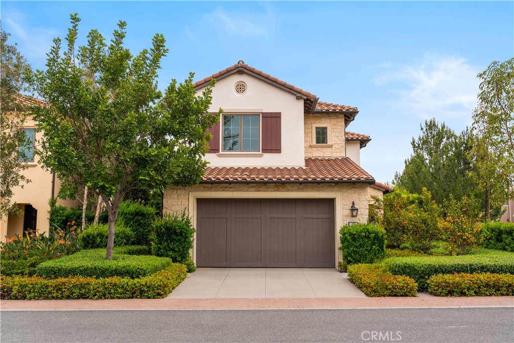Stunning former Irvine Pacific model home in the guard-gated Reserve at Orchard Hills, featuring over $200,000 in premium upgrades. South-facing backyard with serene park view. Thoughtfully designed floor plan with 4 bedrooms and 3 bathrooms, including a downstairs bedroom and full bath. Gourmet kitchen with quartz countertops, full backsplash, built-in refrigerator, pot and pan drawers, and soft-close cabinets. Engineered wood flooring, upgraded carpet, custom window shutters, and recessed lighting. Master suite offers a privacy door, frameless shower, and upgraded tile to ceiling. Additional features include crown molding, chandeliers, two-tone paint, solid core interior doors, open shelving, floating mirrors, and pre-wired alarm system. Energy-efficient upgrades include whole house fan, tankless water heater, and hot water circulation system. Walking distance to park, clubhouse, and pool. Biking distance to Northwood High. Move-in ready!