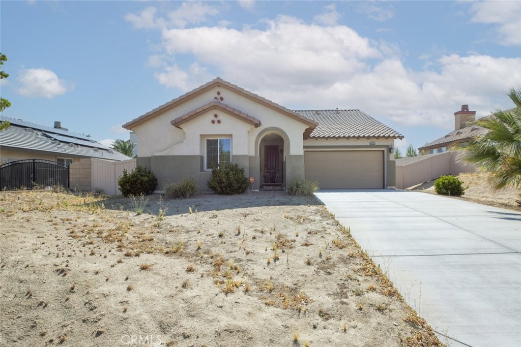 This luxury 3-bedroom, 3-bathroom home offers 1,831 sq ft of beautifully designed living space, complete with a fenced yard, concrete slab backyard, and a small outdoor storage room for added convenience. The home features an attached 2-car garage, an advanced fire suppression system, a seismic shut-off valve, and two mounted fire extinguishers for enhanced safety. Inside, you'll find a modern kitchen with stainless steel appliances, a large island, and open living and dining areas with tile flooring, recessed lighting, and a cozy fireplace. The spacious primary suite includes a walk-in closet and private bath, while two additional bedrooms provide flexibility. For added peace of mind, the property includes a ViViNT security alarm system, with the monthly monitoring fee covered by the owner. Located near parks, schools, and shopping, this well-equipped home offers both comfort and security in a prime Lancaster location.