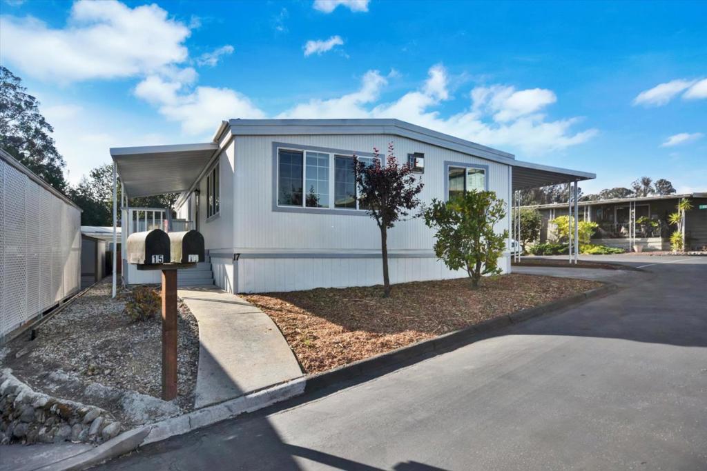 Welcome to this beautifully maintained 2-bedroom 2 2-bathroom, 1,530 sq. ft. home in the highly desirable Soquel Glen Senior 55+ Park. Nestled on a spacious corner lot, this light and airy residence offers an inviting open floor plan that blends comfort with modern upgrades. Pride of ownership is evident throughout, with a long list of recent improvements making this home truly move-in ready. The remodeled kitchen and baths feature fresh finishes and quality upgrades. The kitchen boasts a new oven, upgraded stovetop accessories, and stylish fixtures. A new water heater, upgraded windows, and new lighting enhance both comfort and efficiency. Freshly painted inside and out, this home also showcases new flooring, a new shed roof, new gutters, new exterior skirting, and new fencing. The upgraded back deck is perfect for enjoying the gorgeous backyard, while the new carport slider door adds convenience and style. Soquel Glen offers a friendly, vibrant community setting with beautifully maintained common areas. entertaining. If you're seeking a turnkey home in one of Sequel's most desirable senior parks, 17 Pepperwood Way is a must-see!