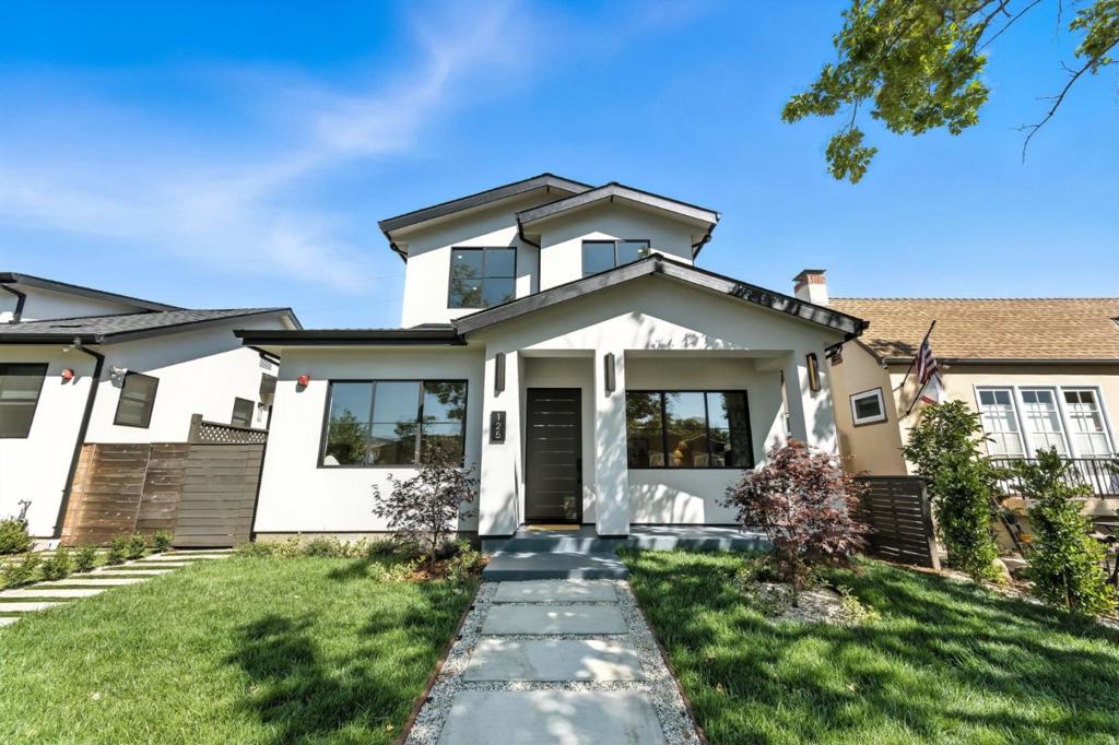 Experience modern luxury living in this stunning 4-bedroom, 3-bathroom residence, ideally located in the heart of San Mateo and zoned for the highly regarded Aragon High School. Designed with a clean transitional aesthetic, this brand-new home features an open-concept layout, soaring 10-foot ceilings, an oversized fireplace in the great room, and abundant natural light throughout. The flexible floor plan includes one bedroom on the main level and three upstairs, including a spacious primary suite with a walk-in closet. The chefs kitchen is the centerpiece, featuring custom cabinetry, designer finishes, pot filler, and an oversized kitchen island that comfortably accommodates seating for four. Luxurious bathrooms showcase Hansgrohe fixtures and custom vanities, creating spa-like spaces for relaxation. Smart lighting in the living areas allows you to control ambiance with ease via smartphone app or voice commands for a truly modern living experience. Adding to its allure, the property features a detached ADU with a full kitchen, bathroom, and a private alleyway entrance ideal for guests, rental income, or a dedicated workspace. Located just blocks from Central Park, shops, and dining, this exceptional property offers modern design, functionality, and a highly walkable lifestyle.