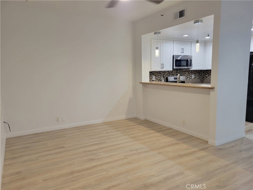 Photo of 720 W 4th Street #104, Long Beach, CA 90802 (MLS # OC26091581)