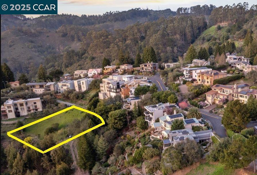 Trophy 'Claremont Heights' vacant parcel. There is no equally opportune comparable offering in the Berk/Oak hills! Treasured cul-de-sac location, never to be thru-traffic -nearly 1/2ac property. Spectacular unobstructed panoramic bay & S.F. views, with a serene verdant canyon foreground. Over 120 ft. of significant frontage for ease of design and requisite curb-appeal. Big proximal privacy, -the home would be no-less than 60 ft. from either neighboring home. Area supports highly correlated resale comps $3m-$4+m homes. Not on market in decades -while retained by the current nearby owners for extended family -now open for your sophisticated forever-home. Substantial value-added in completed engineering, -full grading and compaction documentation. Renowned local Architect R. Janzen 2021 exquisite modern plans transfer with sale, -or your own design. Allowed home size up to 5,700 sqft. Paramount southwesterly exposure for PV & passive solar gain. Little-to-no freeway noise. Core Bay Area! visit exclusively, if accompanied by an agent. Lot merger complete. Views: Downtown