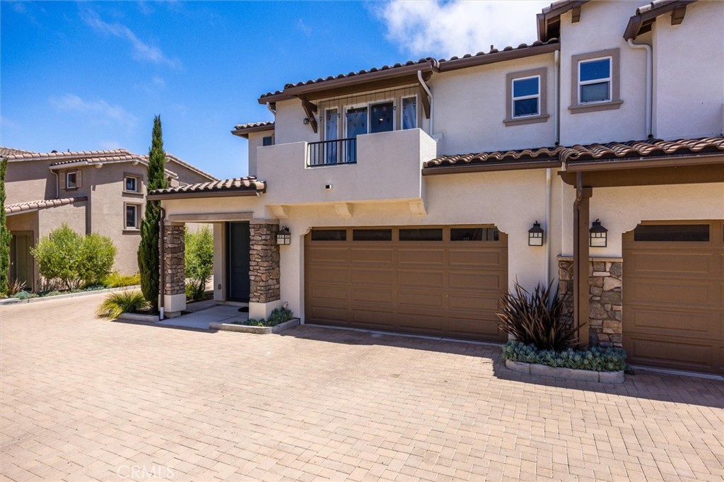 Discover this recently built development of beautiful homes. Well maintained and move in ready, you'll love the open floorplan of the kitchen and living area. Upgraded to 4 bedrooms when built, this lovely home has space for everyone. Except for carpet on the stairs, all flooring is easy care wood laminate. With peekaboo views of the ocean from two areas, the setting is very convenient to beaches and the lively village of Arroyo Grande. Right across the street from Okui's strawberry stand, you'll be enjoying the fruit all season long! Easy maintenance landscaping features pavers and artificial turf in the backyard, great for kids and pets. All bedrooms are upstairs and the laundry room is conveniently located off the kitchen next to the garage. A mere 10 minutes away, you'll be taking in the views of gorgeous hiking/walking trails or enjoying Pismo Beach. Even closer yet, the Oceano Dunes State Park is 1.4 miles down the street. Come take a look right away!