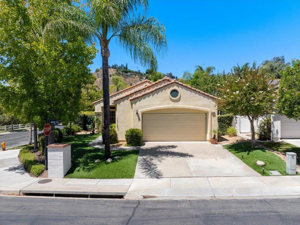 Immaculate single-story home with expansive views of the golf course, pond, and sunsets, located in the gated community of Rancho San Pasqual, part of the Dos Osos Golf Club. Ideally situated on a corner lot offering extra privacy and just a short distance from the community clubhouse with pool, spa, sport court, BBQ and picnic area, and playground. The home has been thoughtfully upgraded with fully owned solar, stainless steel appliances, granite countertops, stone tile backsplash, updated cabinet doors, newer sink and garbage disposal in the kitchen. The family room includes built-in shelving, custom fireplace doors, and a redesigned mantel. The primary suite features new carpet and a remodeled en-suite bathroom with granite countertops, updated faucets, dual sinks, framed mirrors, lighting, toilet, and a walk-in glass shower with decorative tile accents. One secondary bedroom has been converted into a den or office with built-in shelving, pull-out drawers, glass shelving, and mirrored backing. Additional updates include a newer A/C unit, Saltillo tile flooring, updated molding, ceiling fans, window coverings, interior lighting fixtures, and fresh paint throughout. The front and backyard have low-maintenance artificial turf, a tiled patio, retractable awning, outdoor lighting, flowering trees and plants, and elevated golf course views. The home also features an oversized two-car garage offering additional space for storage or work area. Rancho San Pasqual is a private gated community surrounded by natural open space and conveniently located near schools, wineries CONT. golf courses, the San Diego Zoo Safari Park, shopping, dining, and other North County amenities.