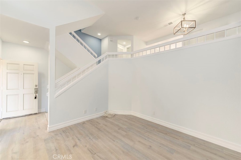 Escape to luxury in this stunning Laguna Niguel townhouse! Recently renovated with modern elegance, this home boasts two spacious master suites, each with its own private bath. Soaring ceilings and an abundance of natural light create a warm and inviting atmosphere. The open-concept floor plan features a gourmet kitchen with new appliances and an open living area perfect for entertaining. Located in a desirable neighborhood, just steps from the pool. This townhouse is conveniently close to shopping, dining, and entertainment, beaches, I5 and toll road. Don't miss out on the opportunity to make this beautiful home yours!
