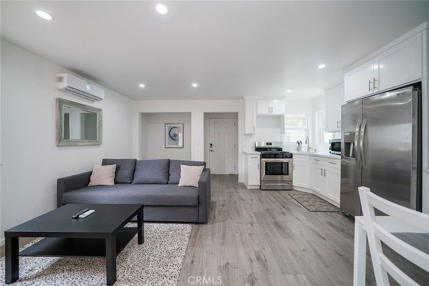 Appreciate the essence of refined living in this pristine, 1 bedroom guest home in the heart of Glendale's tranquil Moorpark neighborhood. Embrace a lifestyle of unparalleled convenience, with the bus line at your doorstep and just a leisurely stroll away from the upscale Americana at Brand, the Glendale Galleria and vibrant Downtown Glendale. Indulge in nearby mouthwatering eateries and trendy shopping venues, or enjoy a captivating evening out—all within arm's reach. Recently renovated to perfection, this home harmoniously combines modern amenities with a timeless aesthetic. Step inside to a space drenched in natural light, welcoming you with fresh paint, polished hardwood flooring, and chic modern fixtures. The well-designed galley kitchen is a chef's delight, showcasing sleek white counters, and stainless steel appliances, including a gas stove and refrigerator. Laundry hook ups are included. Retire to one of the three serene bedrooms, each offering hardwood floors and muted tones, with ample closet space. The bathroom boasts a shower/tub and tile flooring, affording effortless morning rejuvenation. With Thomas Edison Elementary School nearby, easy access to the 5 freeway, and Downtown Los Angeles just a mere 6 miles away, this home is a turnkey retreat for those who value serenity and the ease of urban living. This light and bright one-story is a rare lease opportunity in iconic Glendale, renowned as the safest mid-sized city in America.