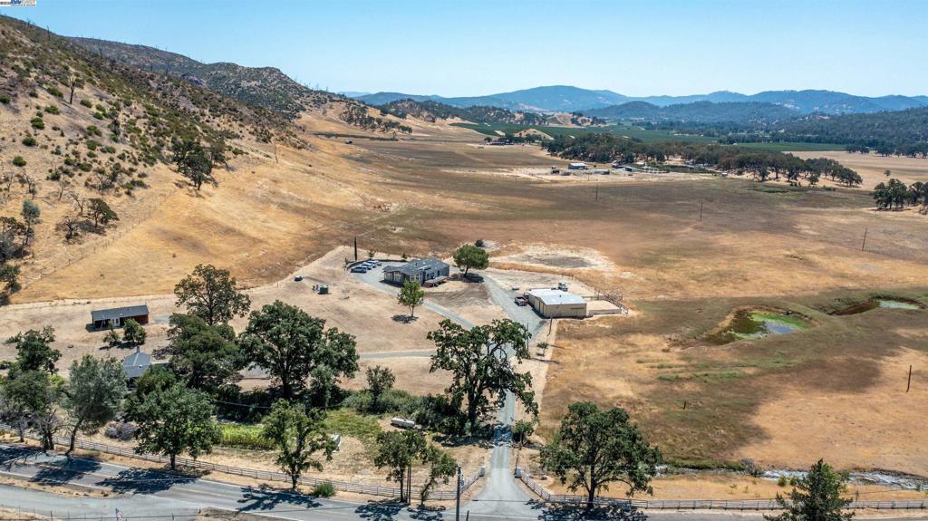 Welcome to Perkins Ranch! A rare Napa County opportunity to build your own family compound. This 40 acre ranch offers a spacious 2,922 sf main home with family, dine in kitchen, 2 spacious bedrooms and a master bedroom with spa like bath, separate office area, and central heat and air. The secondary home offers 966 sf of flexible living space and offers 2 bedrooms, a full bath, and dining area. The homes tranquil backyard offers a shaded canopy under the trees, a perfect place to relax and listen to the stream that runs alongside it. The quaint 684 sf granny unit offers a full kitchen with island and breakfast nook, full bath and spacious and bright bedroom. The ranch is fully equipped with 1,280 sf workshop with ample storage space and concrete slab floor. Additional storage includes a 574 sf lean-to attached to the shop, perfect for equipment storage. Other features include two ponds with a holding capacity of three acre water feet and spring that runs through the property. Water availability is abundant and incudes a high producing domestic well (3 wells total), and a 2,500 gallon water tank that easily provides water to all three homes. The listing includes two separate addresses on one parcel. 7878/76 Butts Canyon Rd. Close to Pope Valley, Napa, St. Helena & so much more!